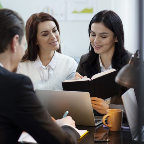 medium-shot-people-working-together-office